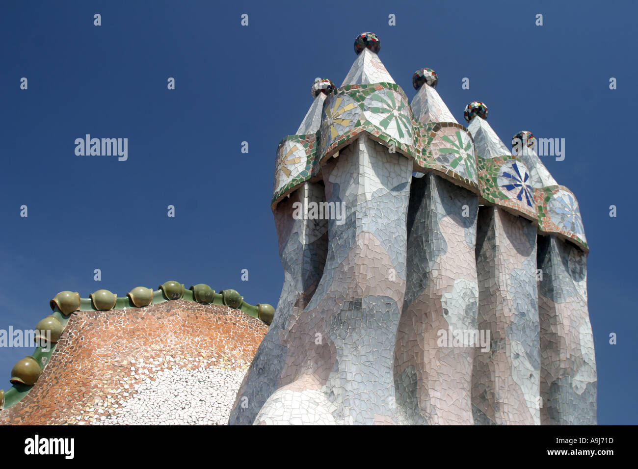 Barcelona Casa Batllo by Antoni Gaudi chimneys on roof top terasse  Stock Photo