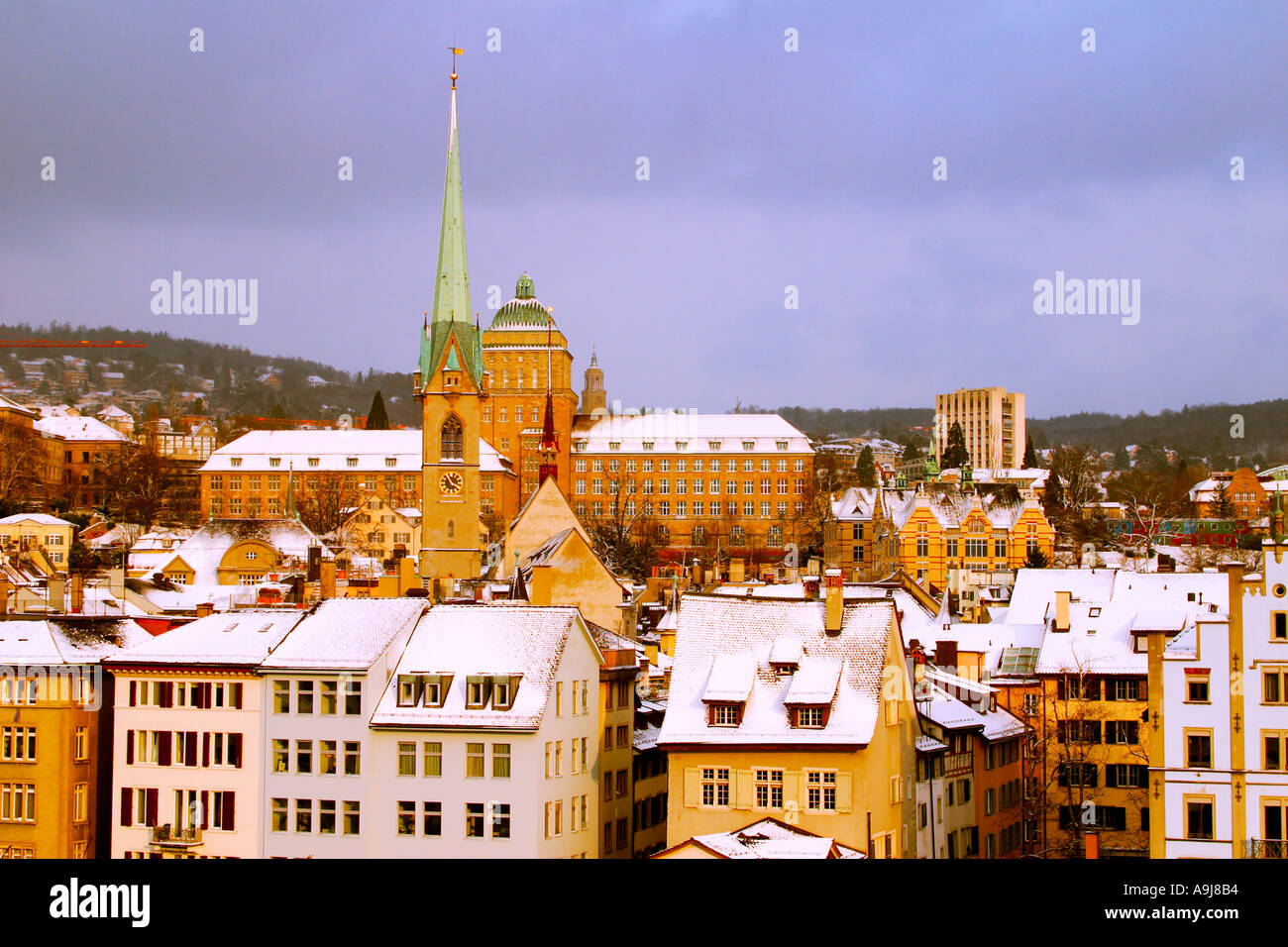 Switzerland Zurich panoramic view from Lindenhof to old city center in winter snow university Stock Photo
