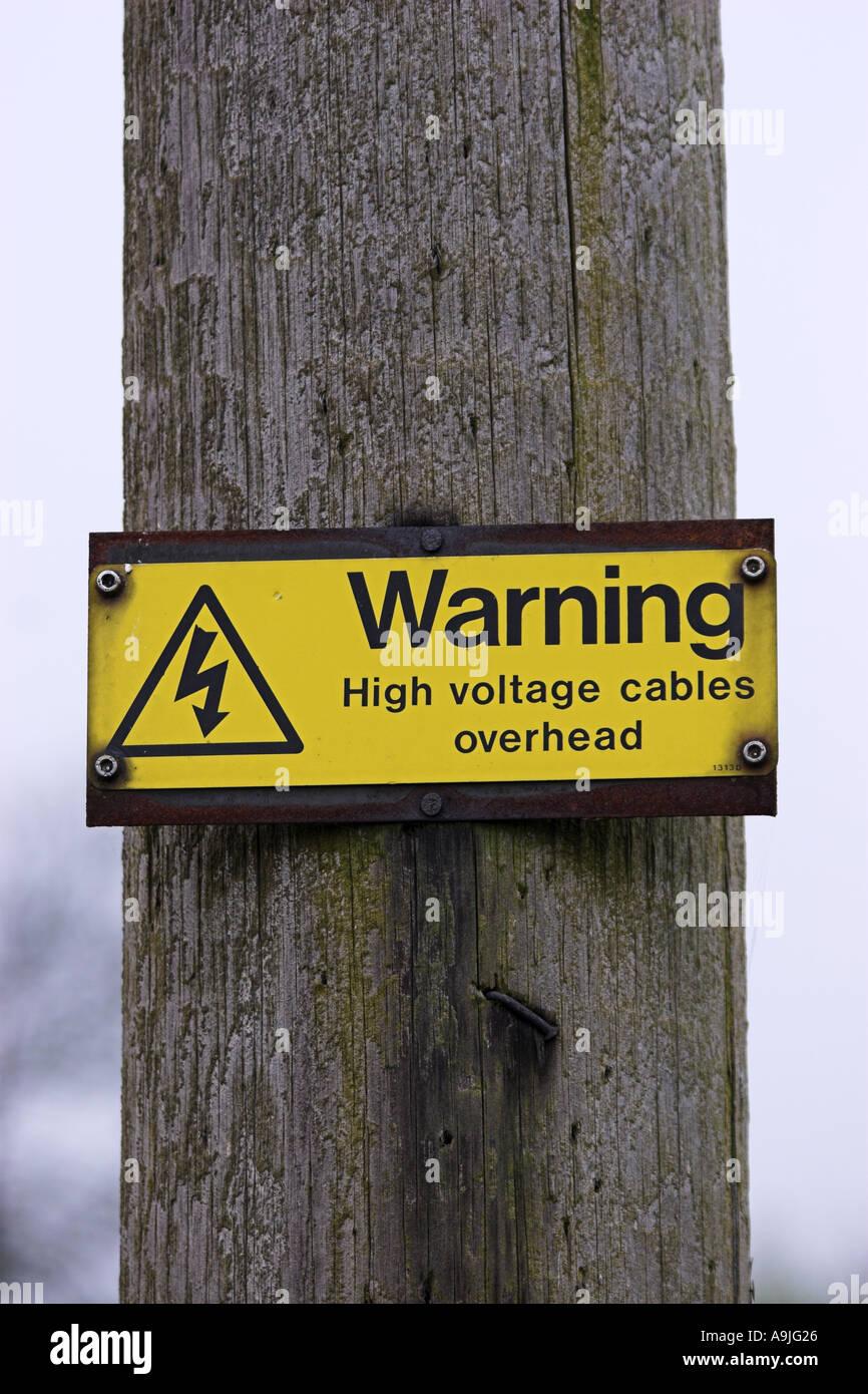 Warning High Voltage Cables Overhead Stock Photo Alamy