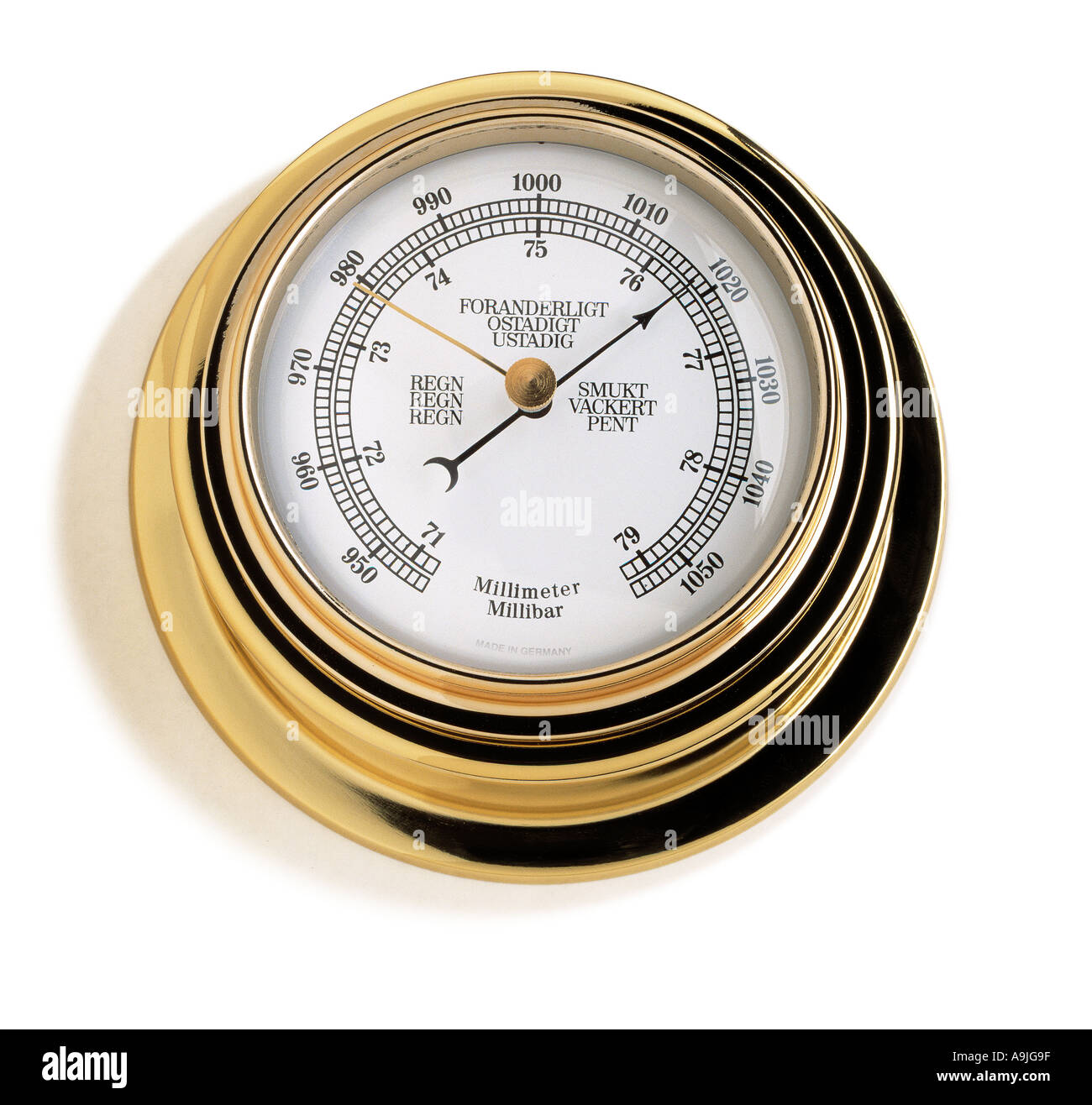a brass weather barometer Stock Photo Alamy