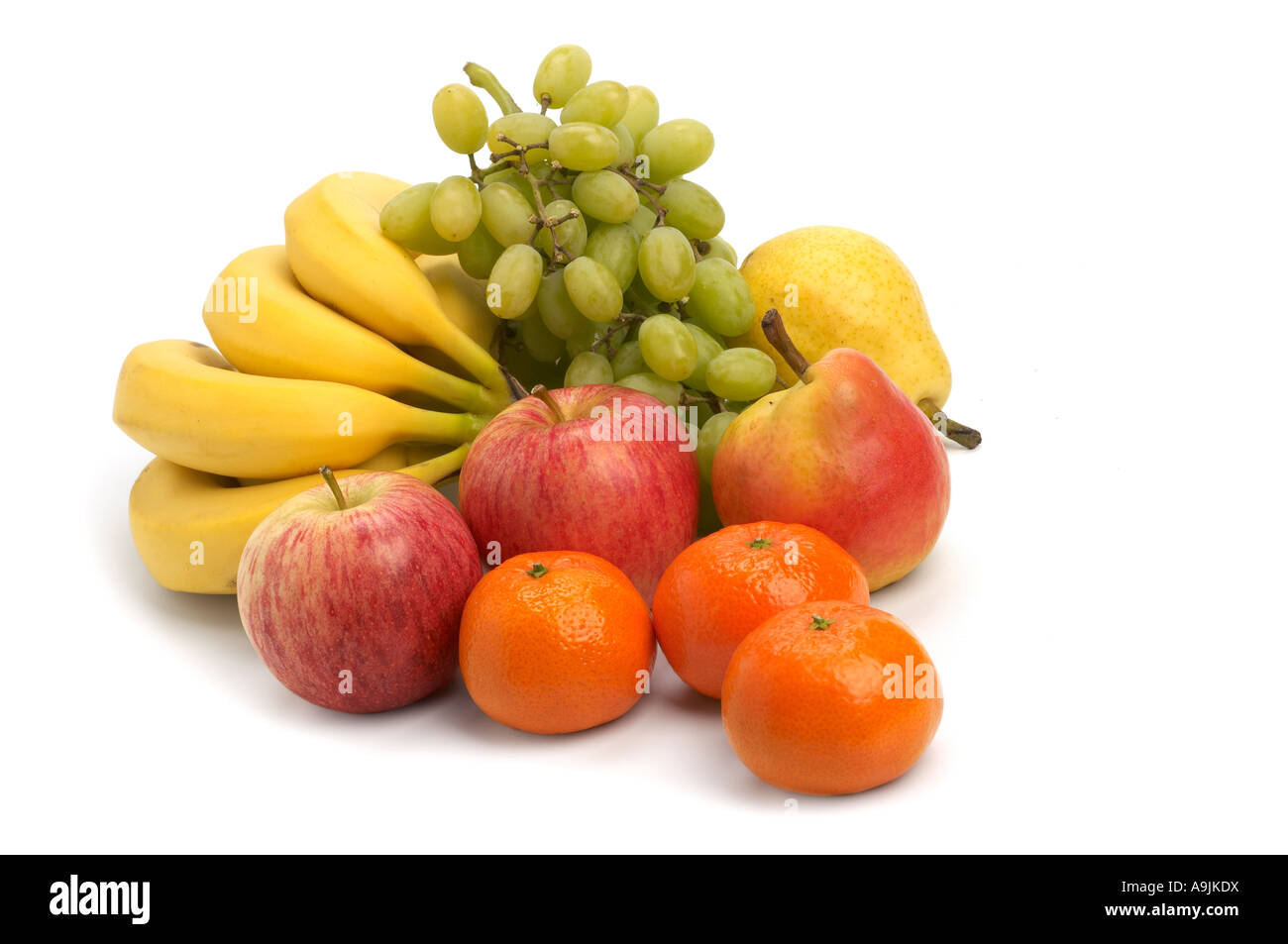 Collection of fruit bananas pear clementines grapes and apples Stock ...