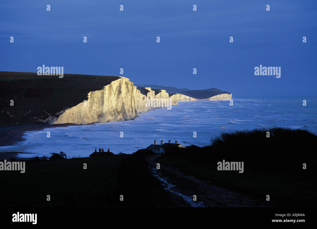 Line of Chalk Cliffs looking East from Seaford towards Beachy Head and Eastbourne South Coast of England Stock Photo