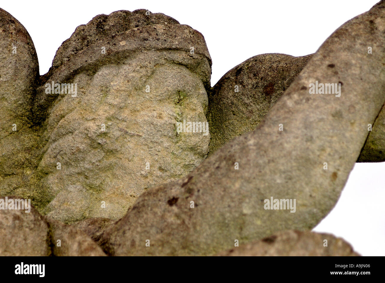 A statue eroded by acid rain on the edge of Willen Lake near Milton Keynes Stock Photo Alamy