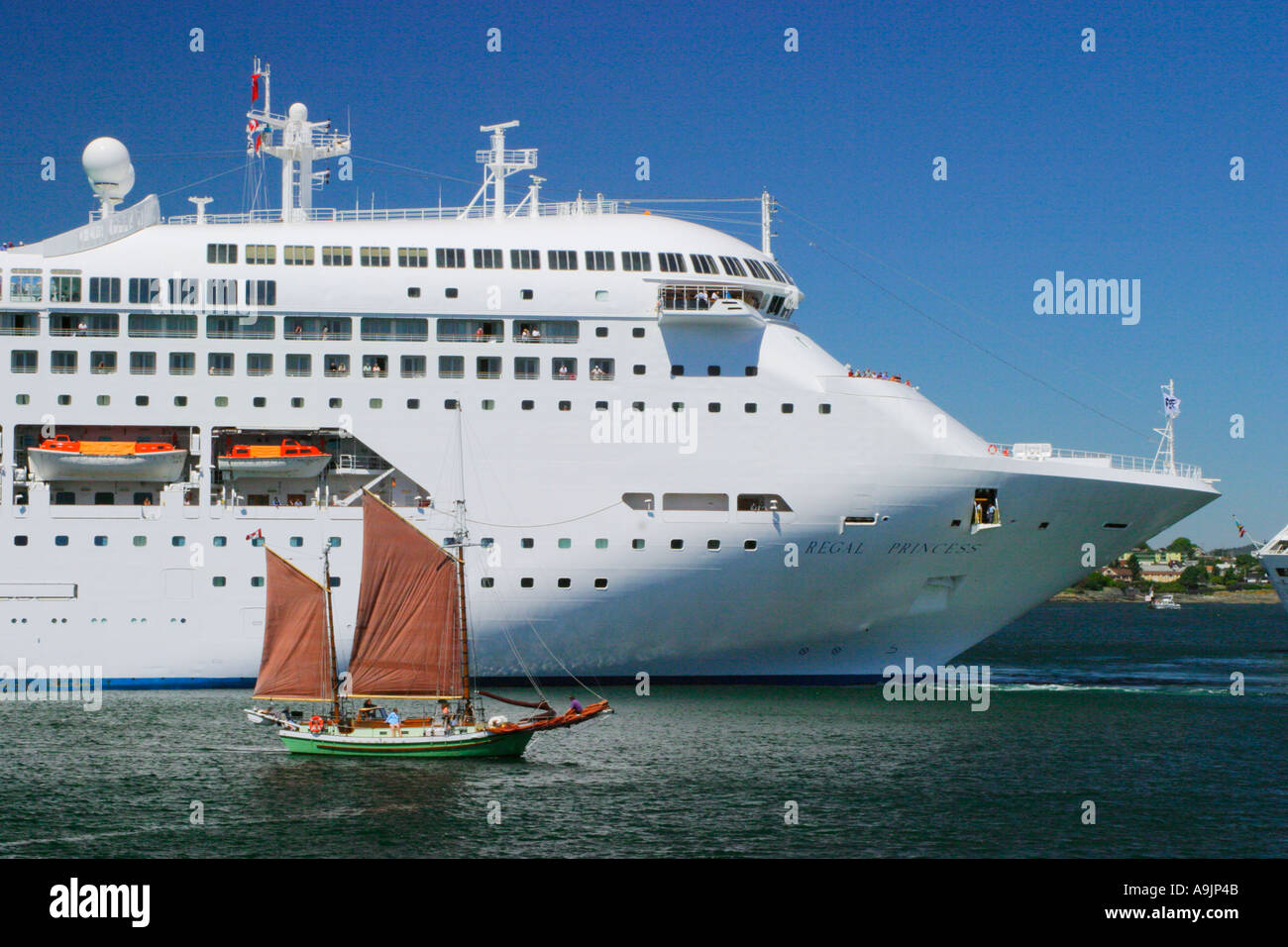 Regal Princess cruise ship and yacht near port of Victoria Stock Photo ...