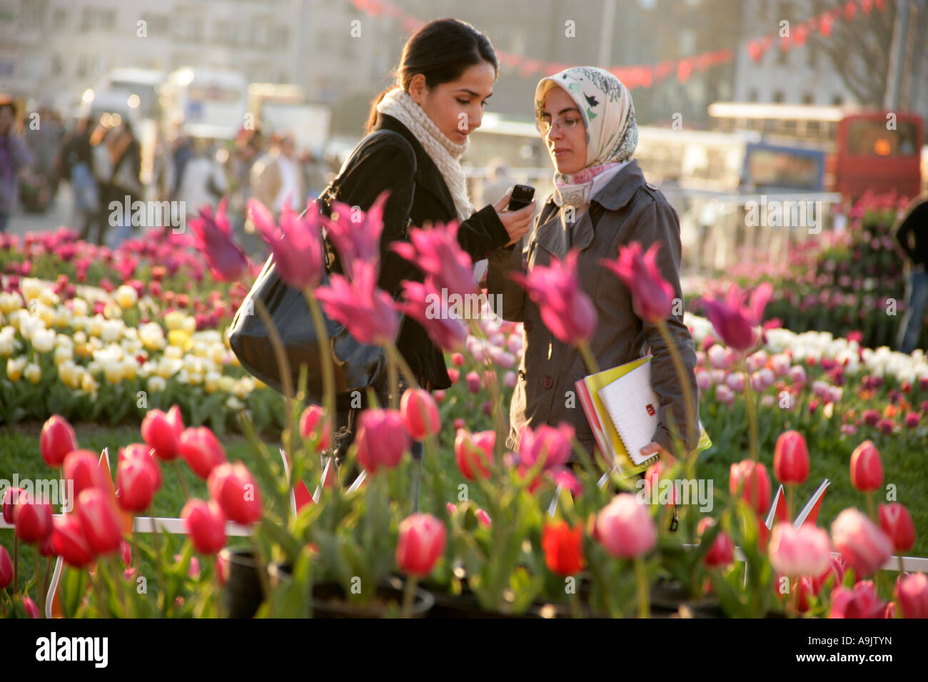Girls at the Tulip Festival on Taksim Square, Istanbul, Turkey Stock Photo