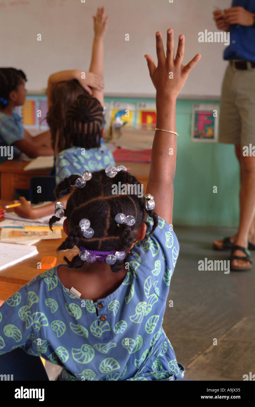 Children hands raised classroom hi-res stock photography and images - Alamy