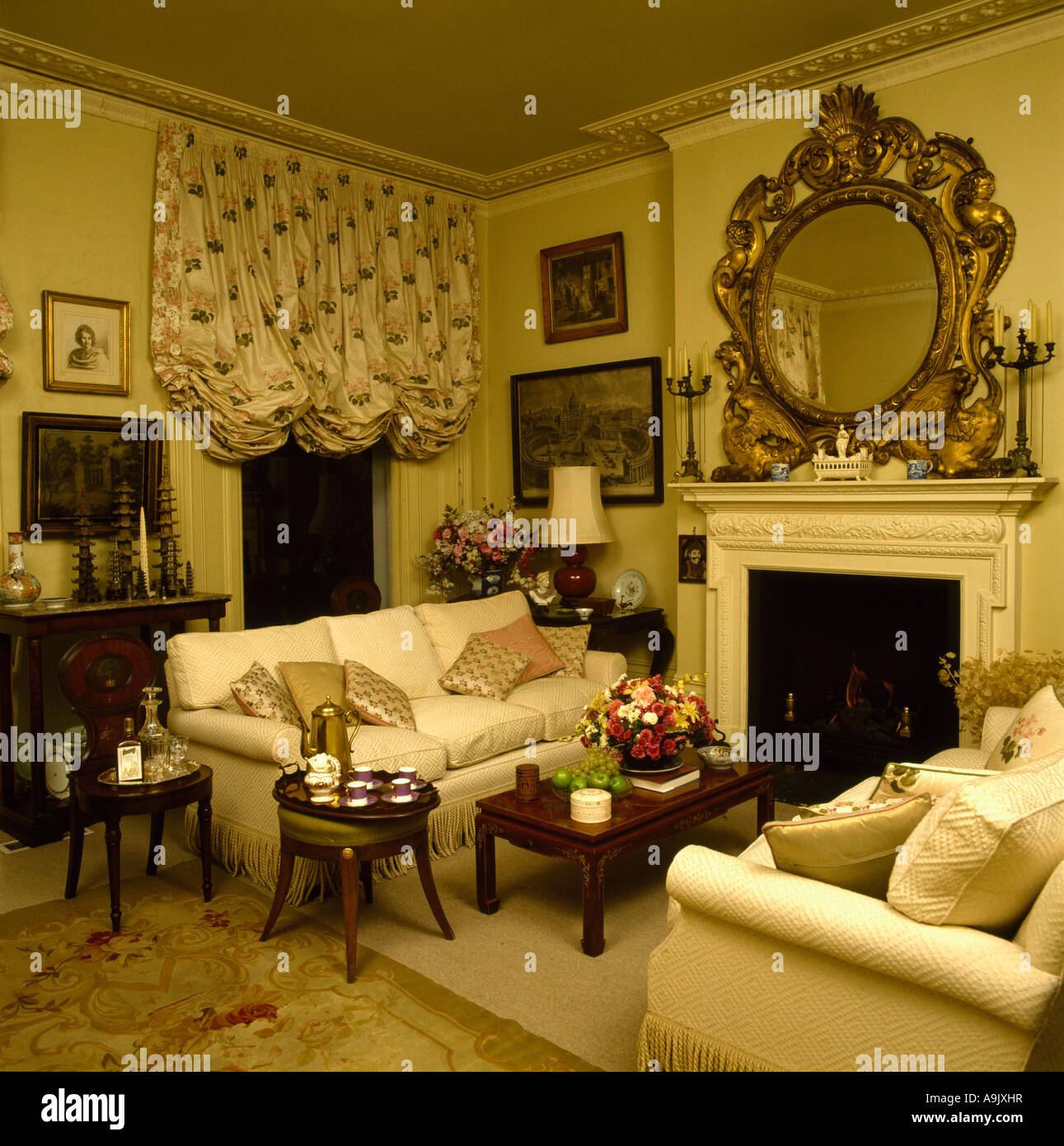Gilt mirror above fireplace in hi-res stock photography and images - Alamy