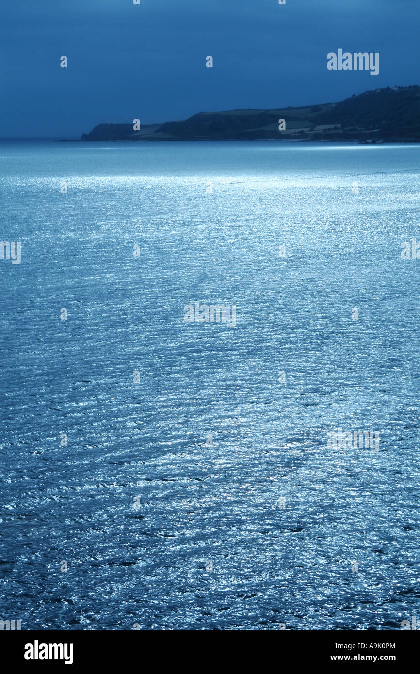 moonlight reflecting on the sea Stock Photo