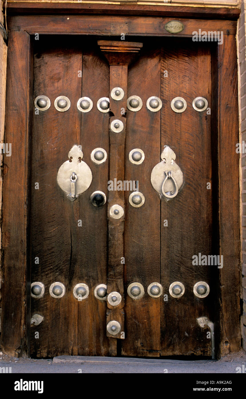 Iran Yazd, door showing two different types of door knockers one for
