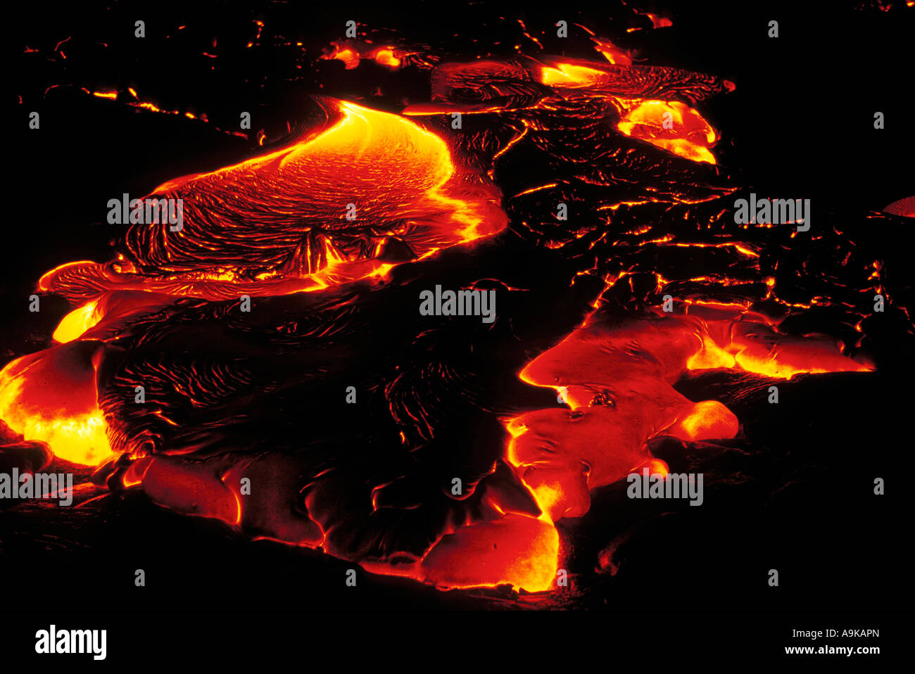 Surface lava flowing at night Hawaii Volcanoes National Park The Big
