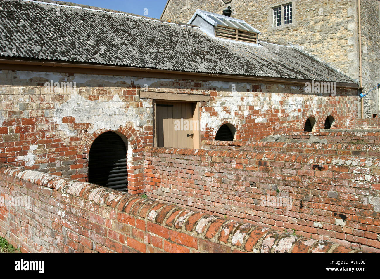 Pig sties and farm buildings and outhouses Stock Photo - Alamy