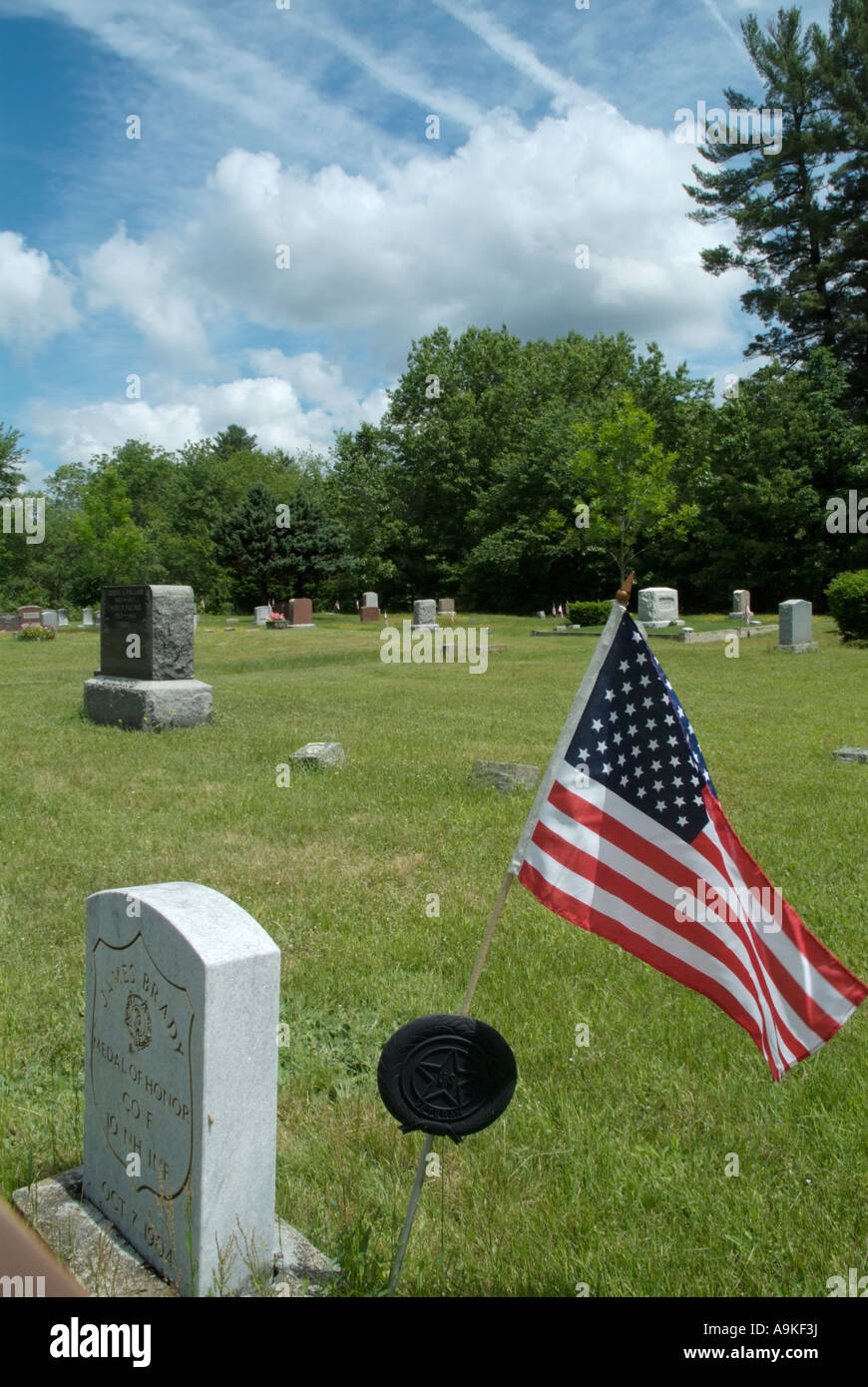 Old weathered headstones at Old Pine Grove Cemetery in Raymond New