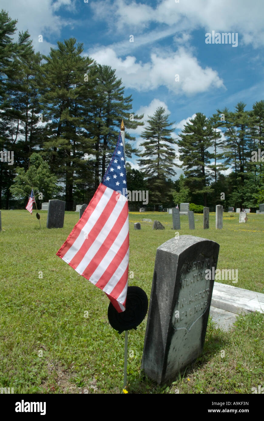 Old weathered headstones at Old Pine Grove Cemetery in Raymond New