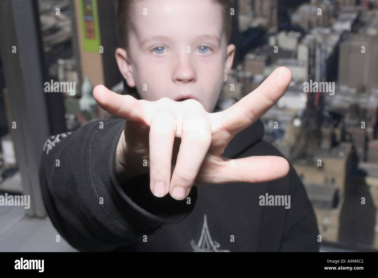 Boy age 11 portrait with Midtown Manhattan New York City background Stock Photo Alamy