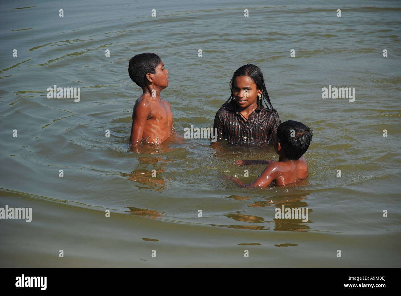 CHILDREN HAVING BATH IN A POND Stock Photo Alamy