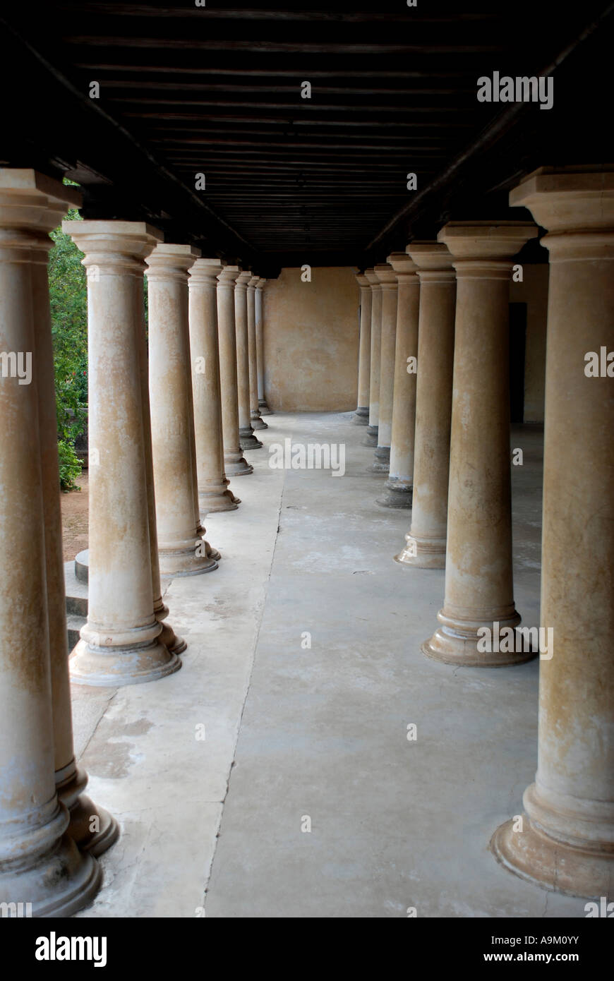 Concrete pillar in woodn palace thakkal kerala Stock Photo Alamy