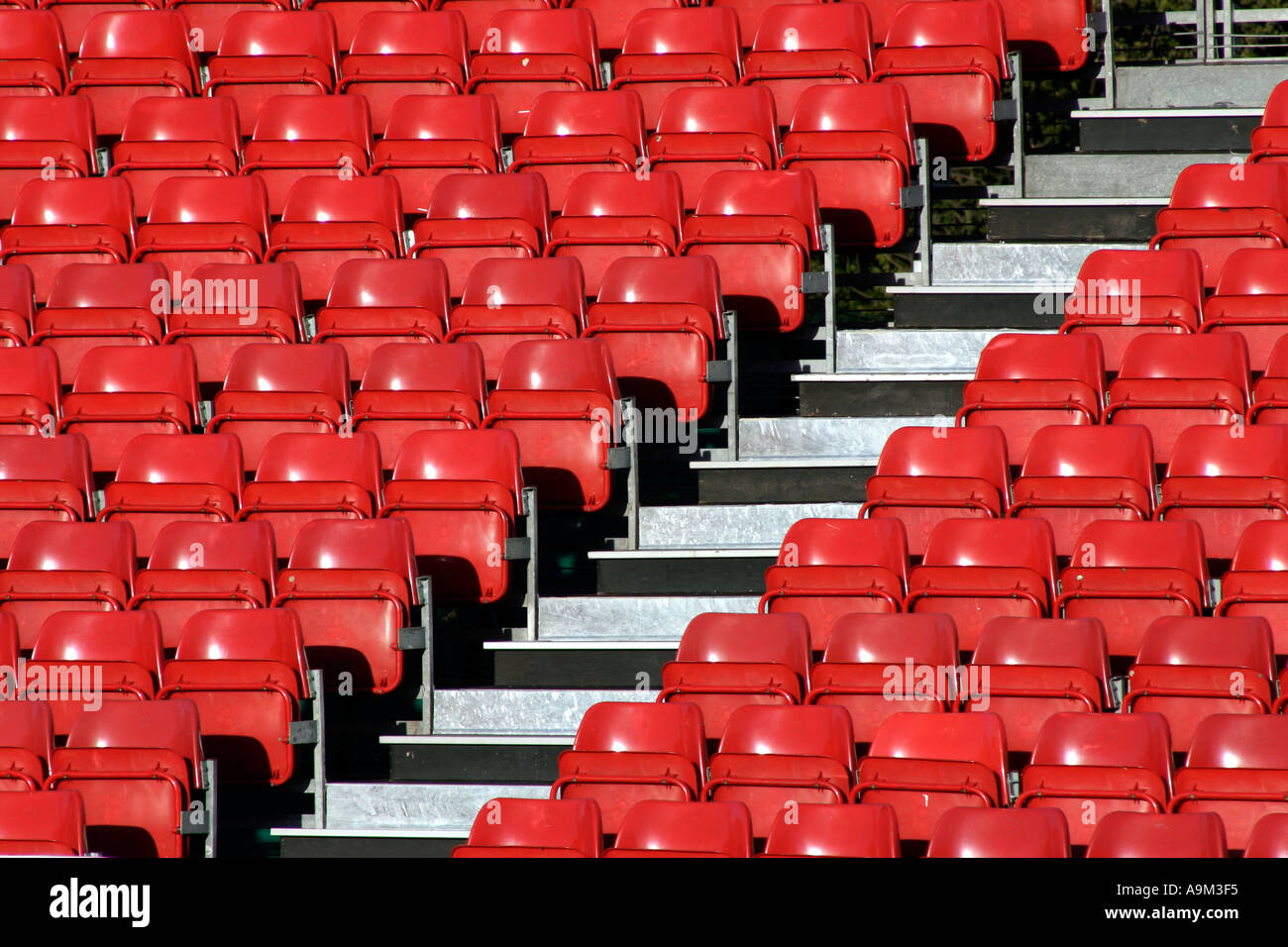 Patterns formed by rows of seats on an arena stand Stock Photo - Alamy
