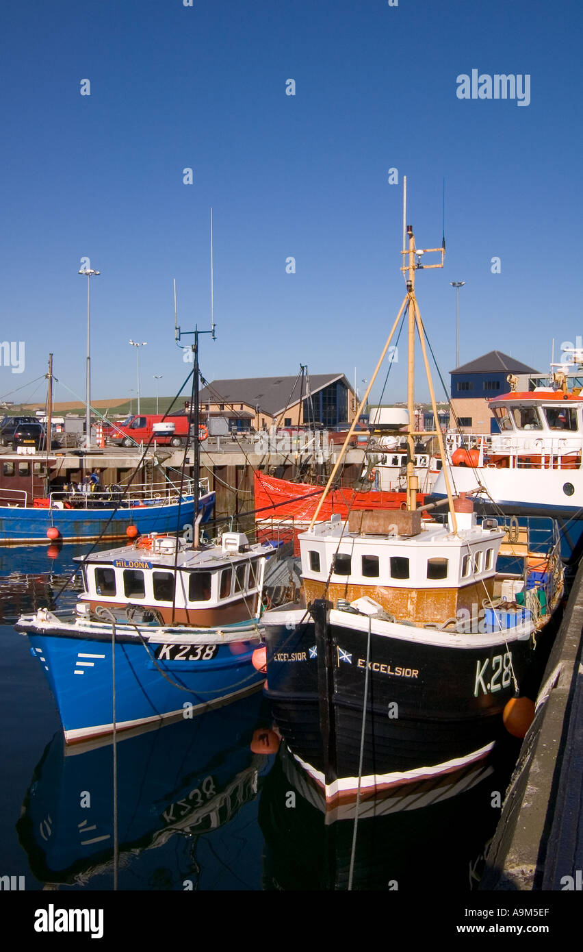 dh Harbour STROMNESS ORKNEY Fishing boats berth at quayside boat scotland tied up Stock Photo