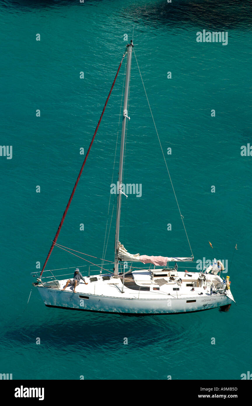 sailboat anchoring in Cala Galdana Stock Photo