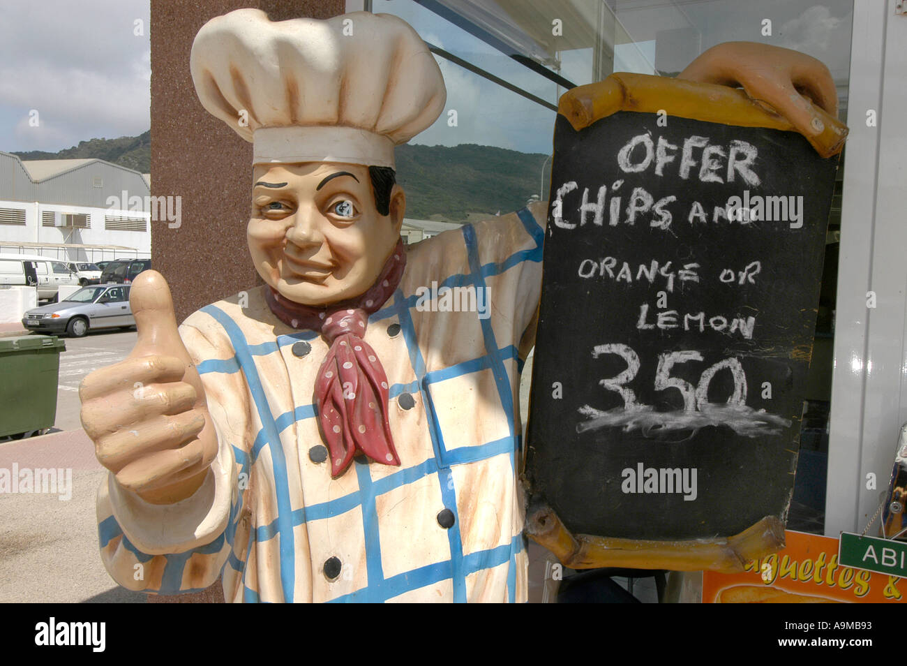 artificial chef or cook attracting customers Stock Photo
