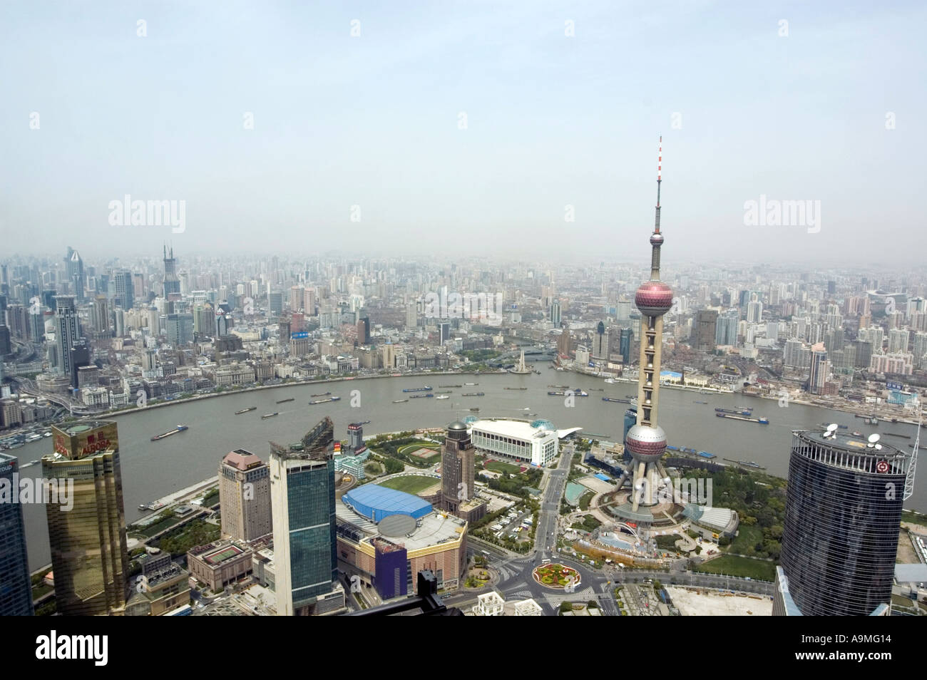 AERIAL VIEW OVER THE HUANGPU RIVER FROM PUDONG FINANCIAL DISTRICT ...