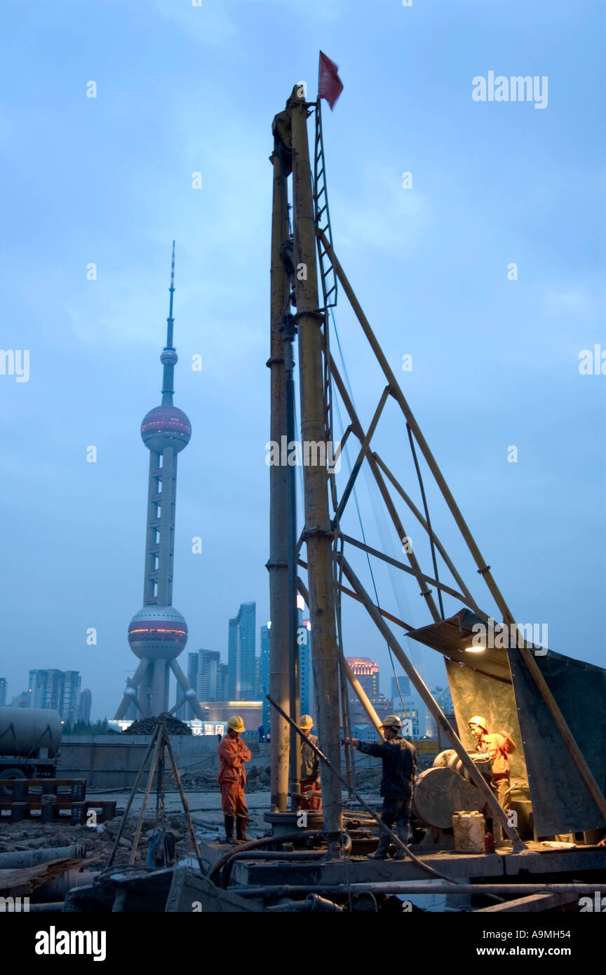 DRILLING FOUNDATIONS ON CONSTRUCTION SITE SHANGHAI CHINA Stock Photo