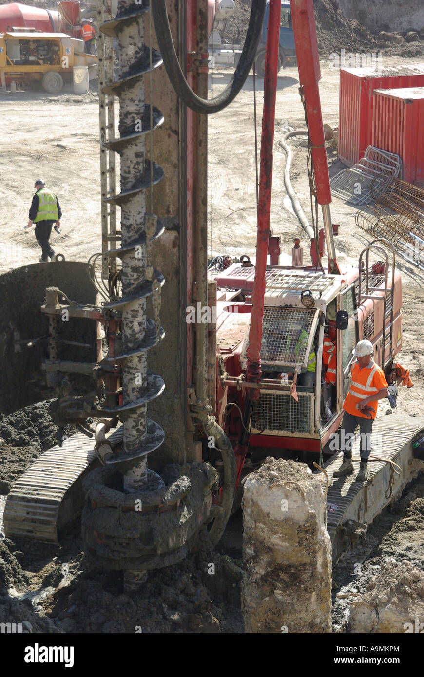 London Pile Boring Auger Attached To Large Piling Rig Beside Exposed
