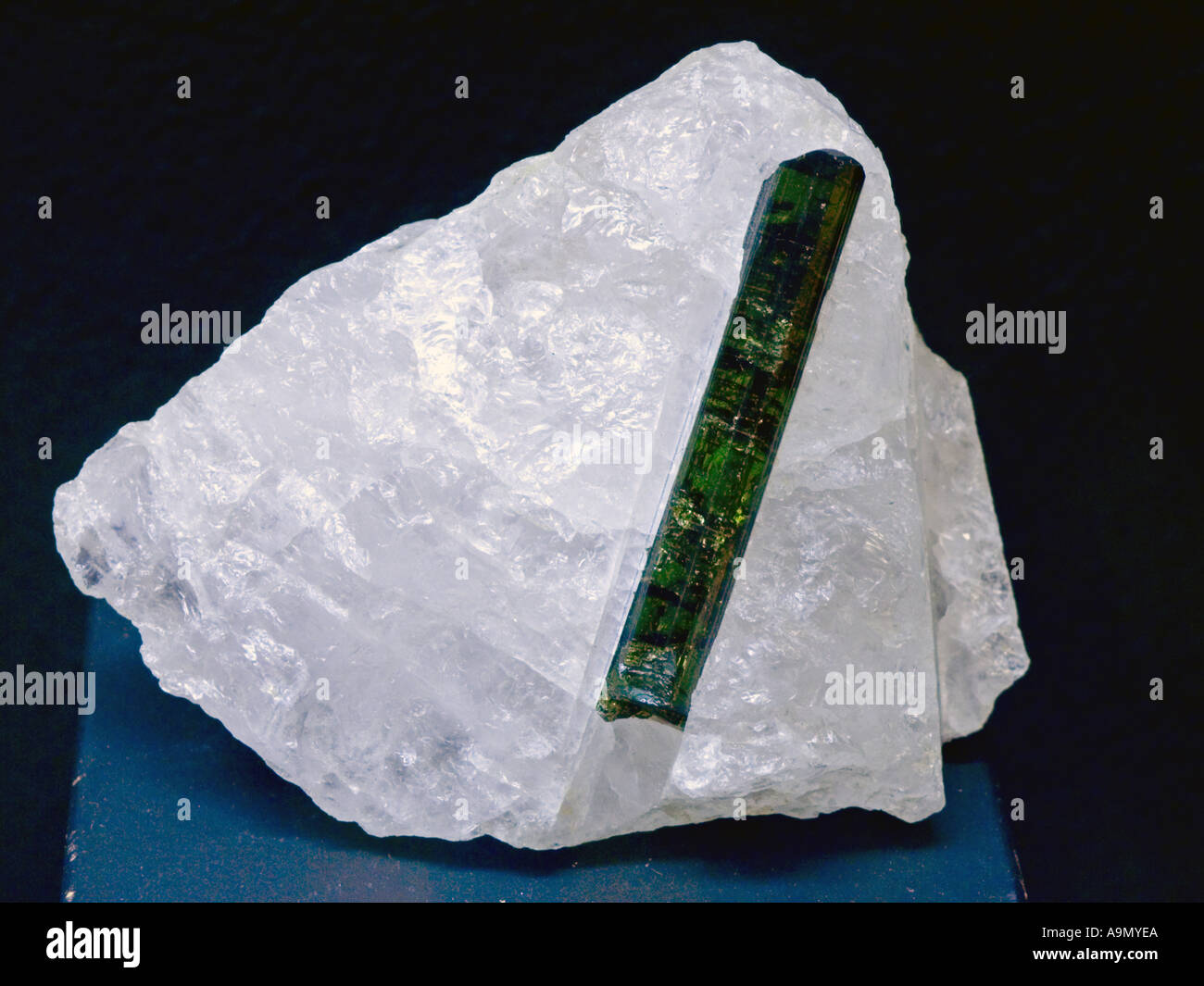 Turmalin in Quarz Mineral stone rock metal crystal crystaline gem gems natural scientific science spike geo geology geography en Stock Photo