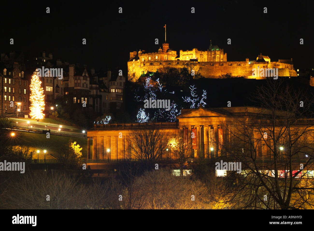Edinburgh Castle and the National Gallery of Scotland illuminated during the Christmas festival, Edinburgh, Scotland, UK. Stock Photo