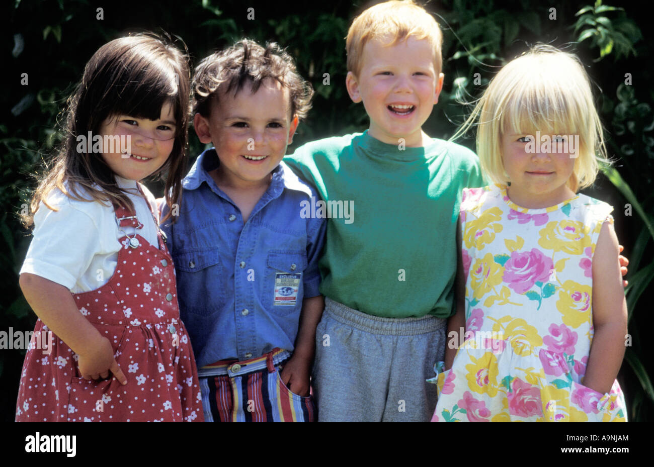 Four little children, 2 boys and 2 girls, aged four Stock Photo - Alamy