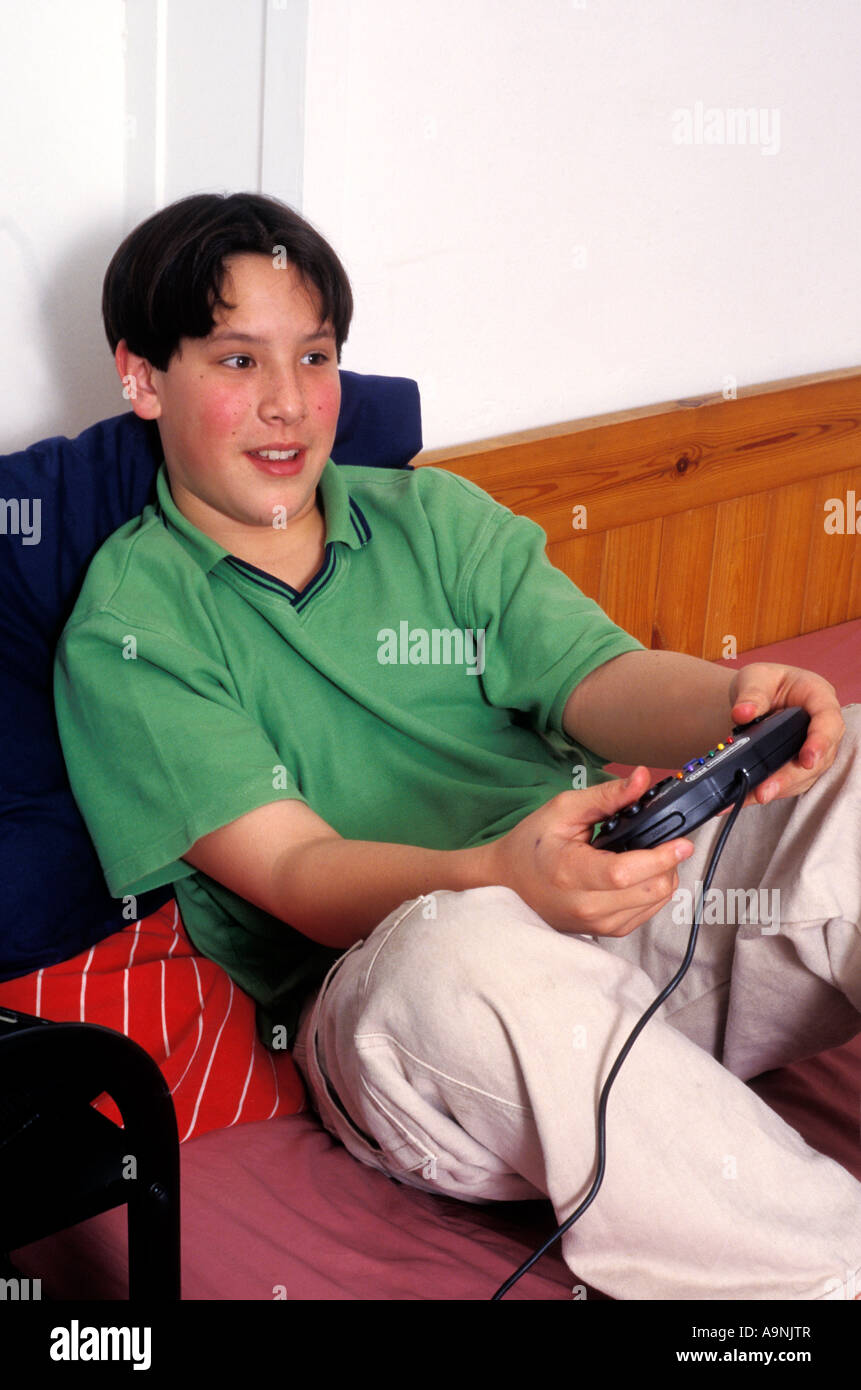 young teenage boy on playstation Stock Photo