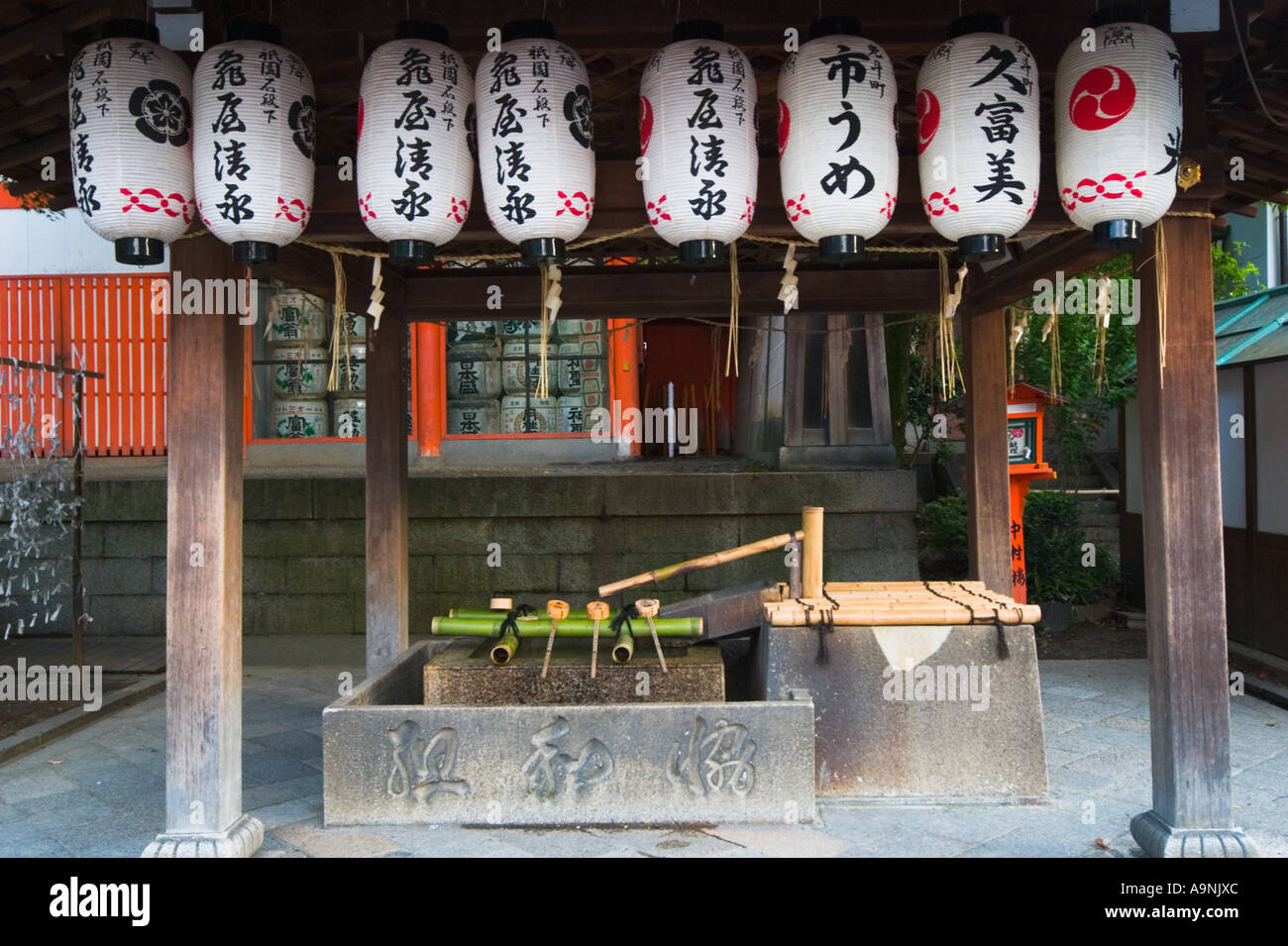 Paper lanterns hanging from the gazebo over the purfication fountain at