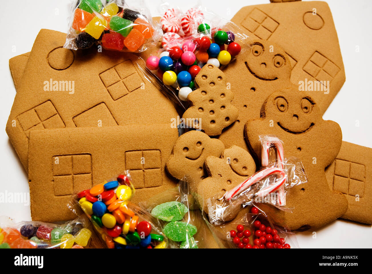 Image showing all the parts to a gingerbread house piled together ready