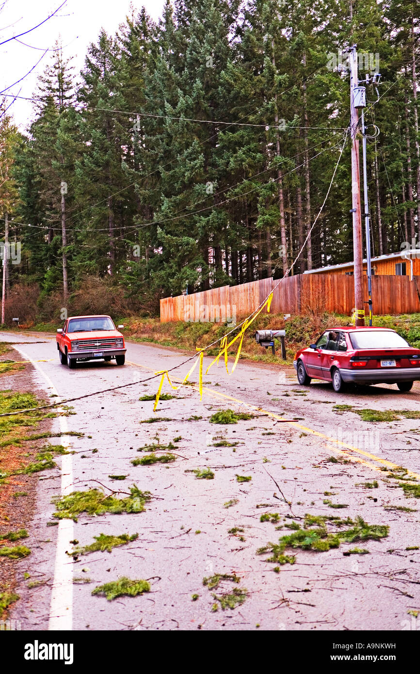 Image of a car and a truck driving opposite directions taking turns ...