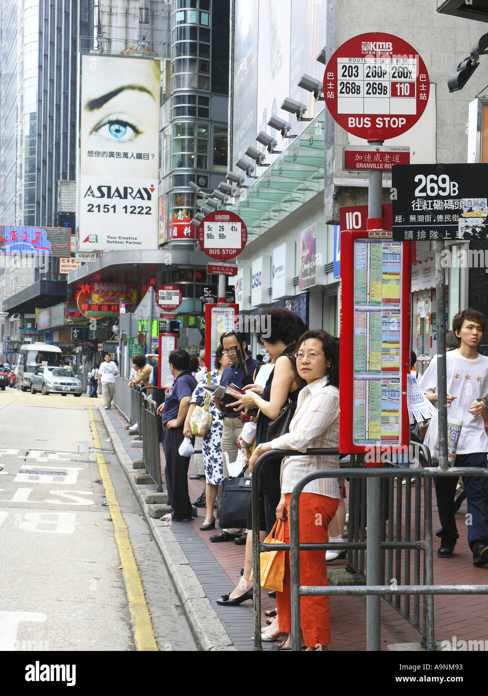 Bus stop passenger Tsimshatsui Kowloon hong kong china chinese asia ...