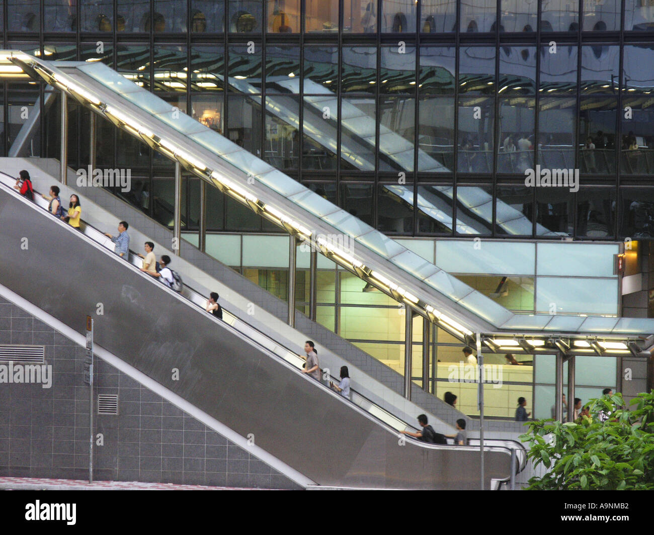China Hong Kong Central district pedestrian commuter escalator to subway MTR Stock Photo