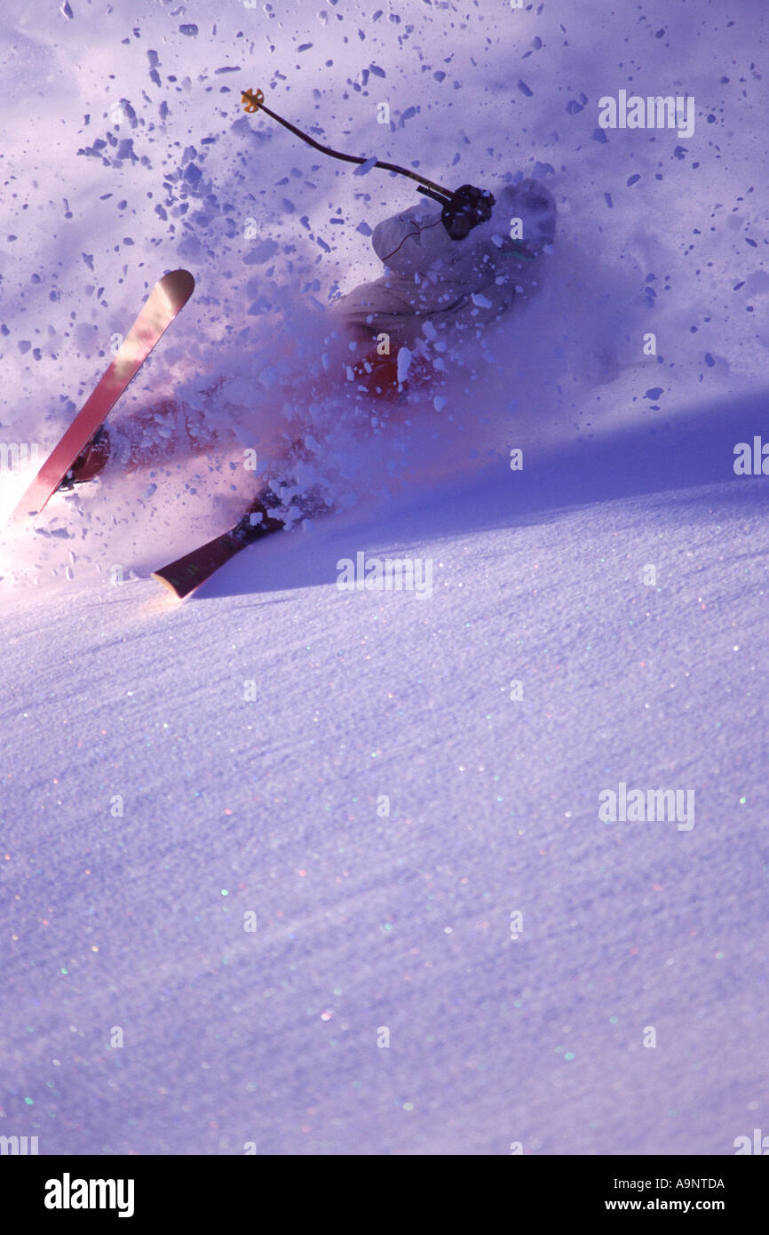 A man skiing powder snow at Brighton UT Stock Photo