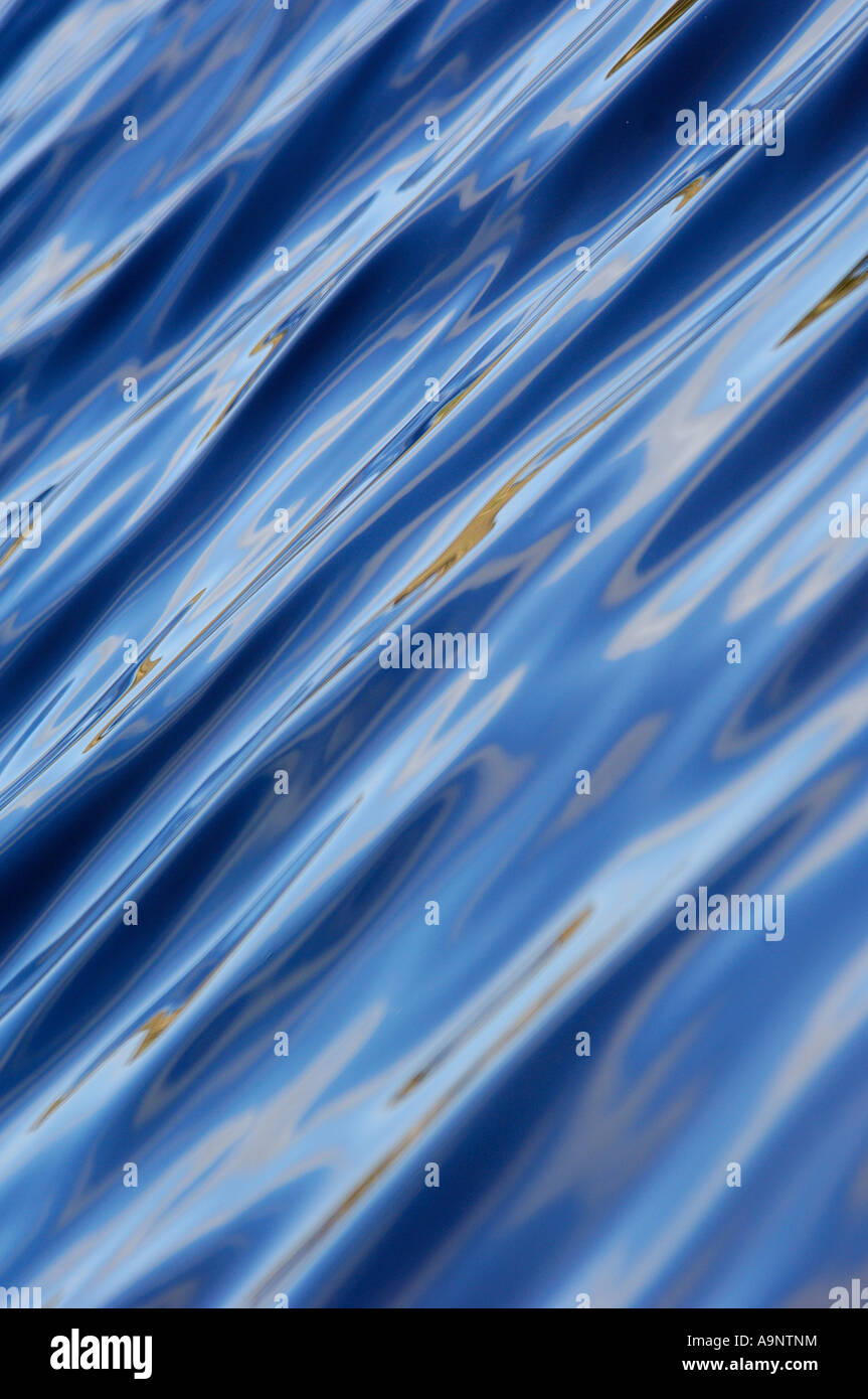 Lovely close up abstract study of ripples on a lake frozen in time and motionless set at a diagonal Stock Photo