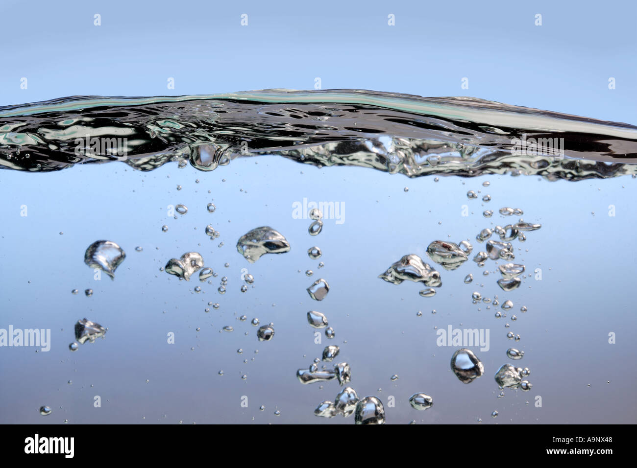 water and air bubbles rising to the surface Stock Photo - Alamy