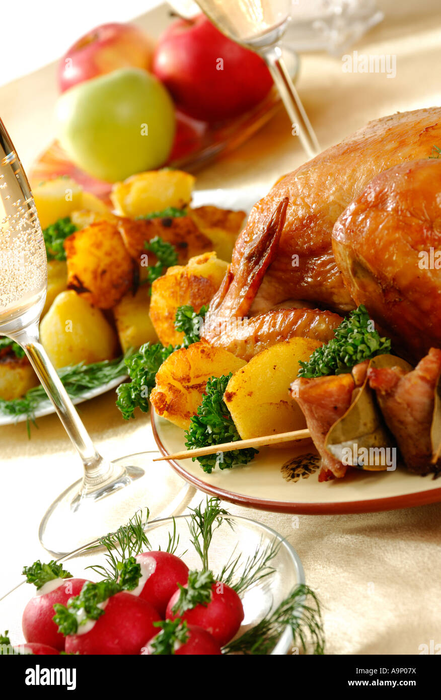Festive food flavoured roast chicken and fried appetizing potatoes Holiday dinner meal celebration turkey Stock Photo