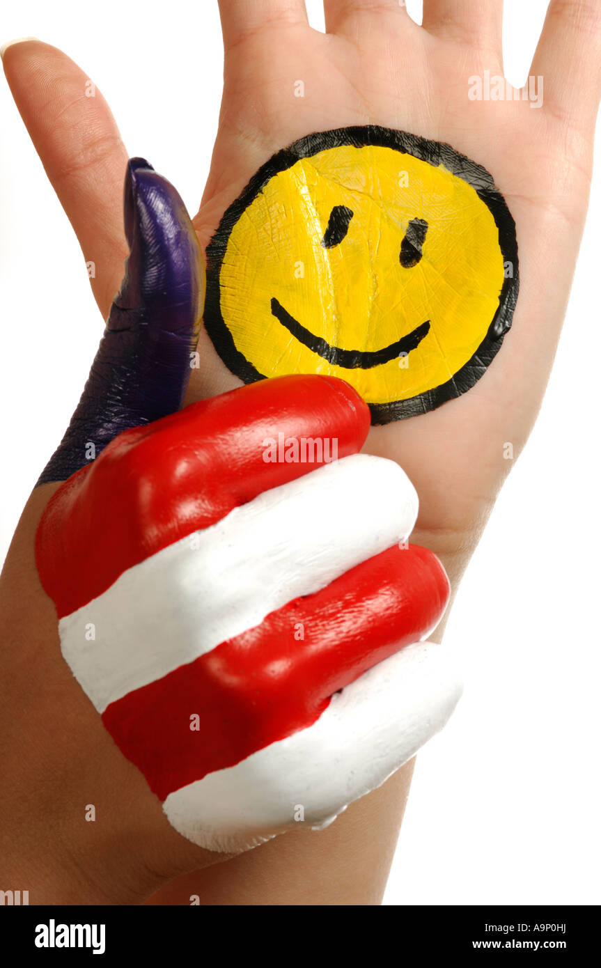 Hands with a funny smiley face and american national colors showing thumb up gesture Patriotic concept Stock Photo