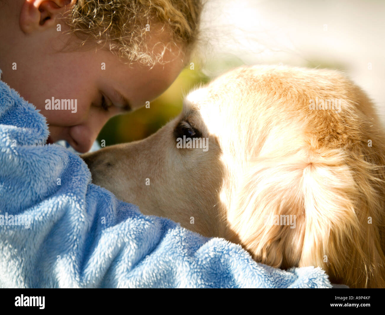 Closeup of young girl with her dog Stock Photo