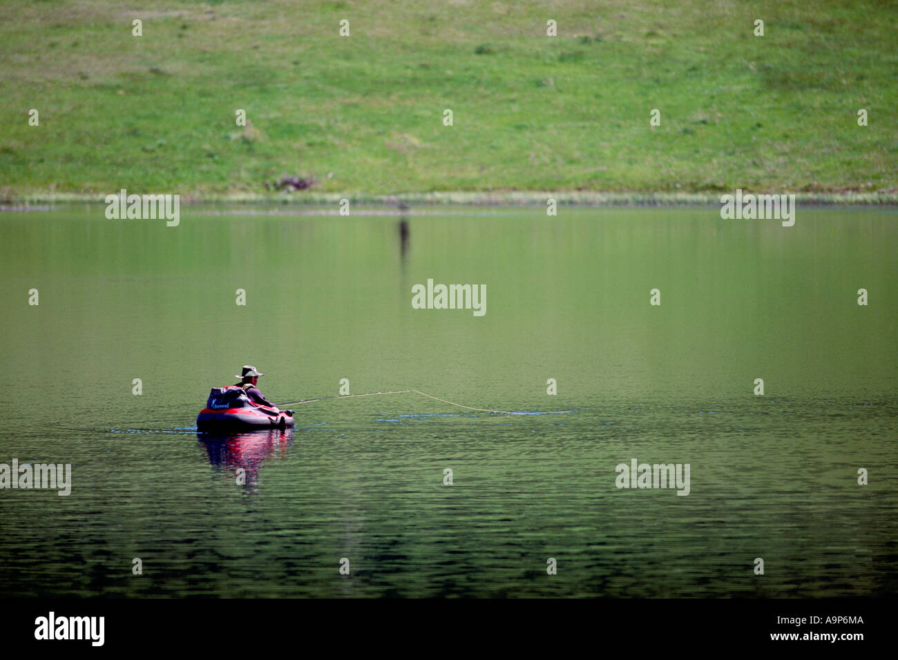https://c8.alamy.com/comp/A9P6MA/fisherman-sport-fishing-in-belly-boat-in-nicola-lake-near-merritt-A9P6MA.jpg
