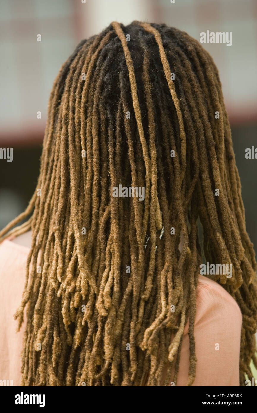 Rear view of woman with dreadlocks Stock Photo - Alamy