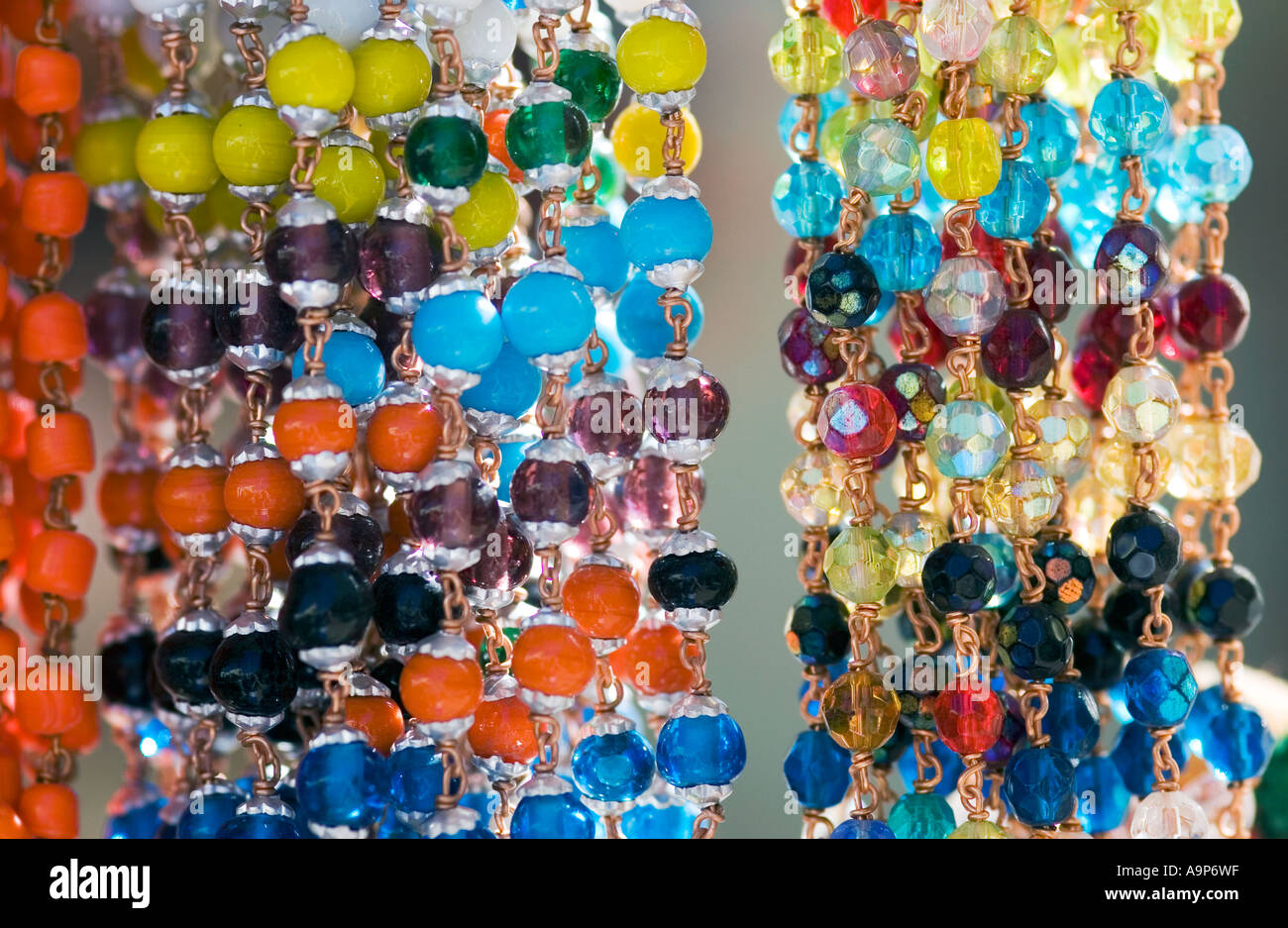 Coloured japamala prayer beads on a stall in India Stock Photo
