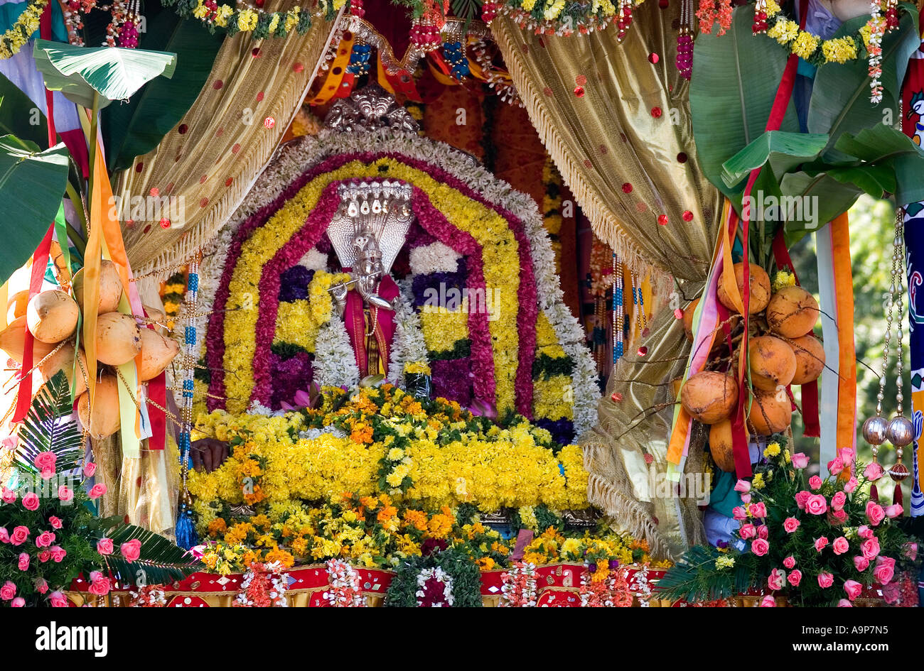 Krishna statue on chariot during Indian festival parade Stock Photo