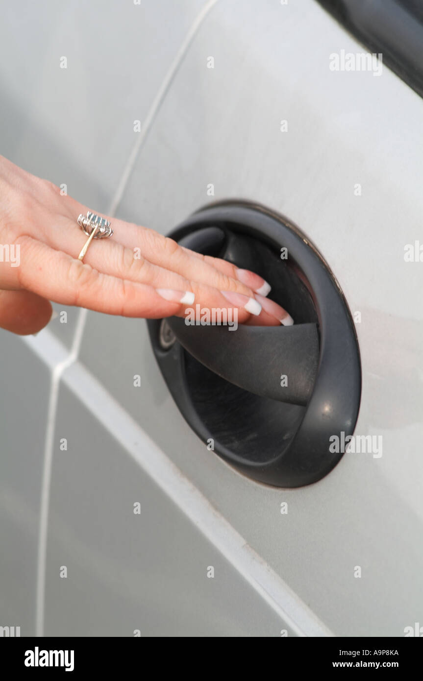 door, handle, car, fingernail, fingernails, ring, female, woman, girl, feminine, driver, drive, driving, buyer, Stock Photo