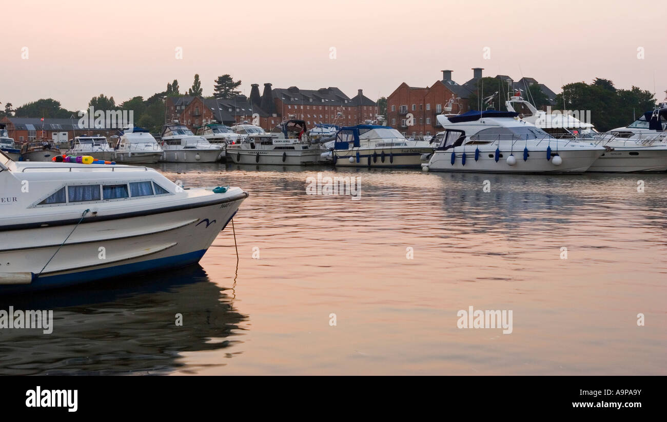 Boats moored in Oulton Broad near Lowestoft the southern gateway to the Norfolk Broads Eastern England UK Stock Photo