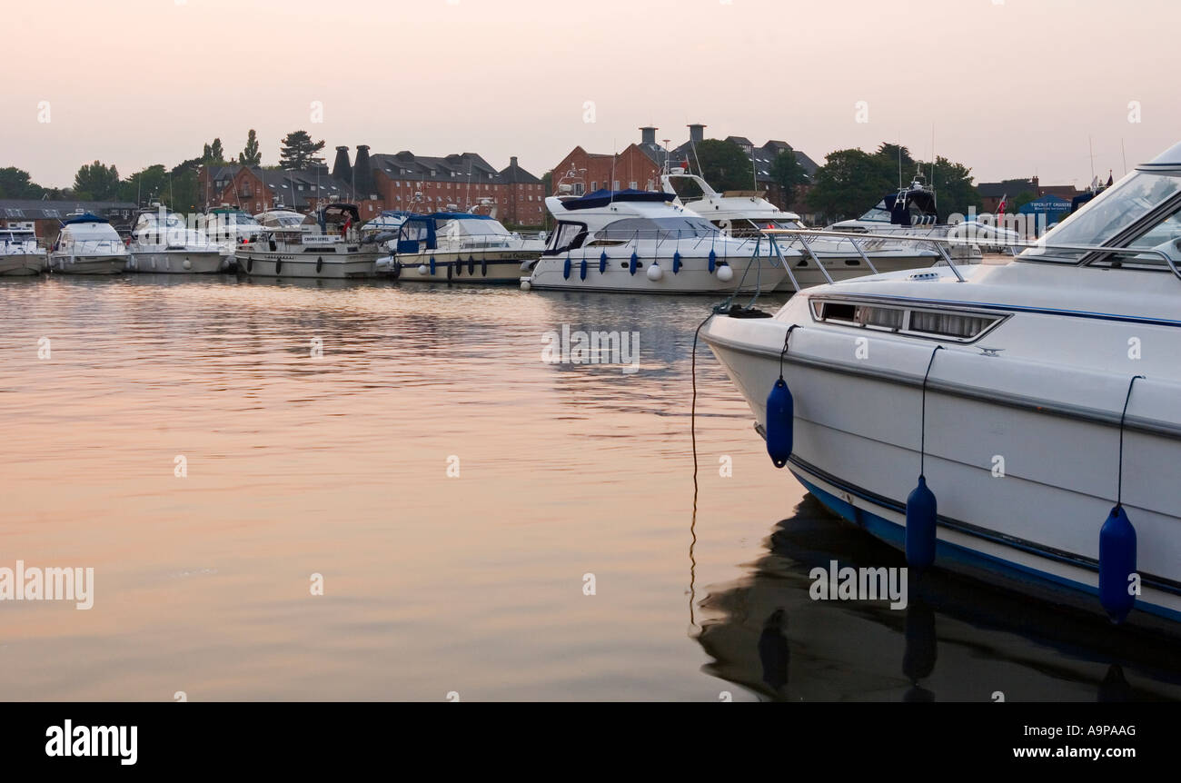 Boats moored in Oulton Broad near Lowestoft the southern gateway to the Norfolk Broads Eastern England UK Stock Photo
