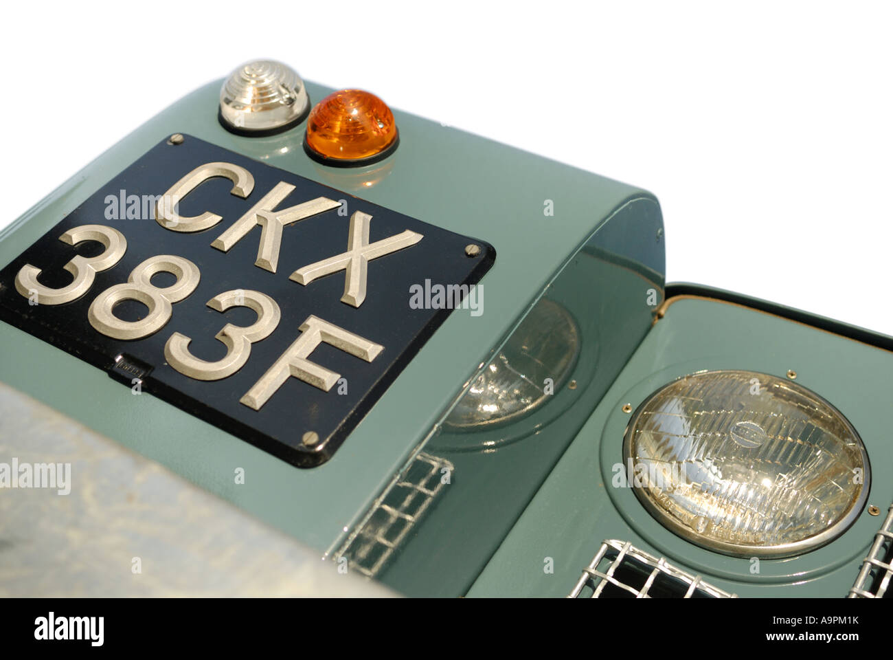 Close up of a freshly restored 1968 Land Rover Series 2a front with an age related black UK number plate. Stock Photo